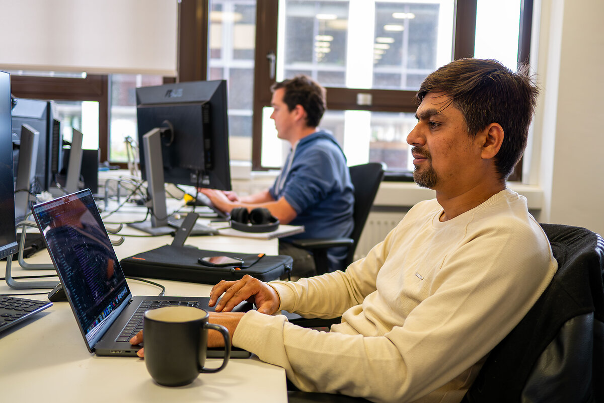 People working on computers