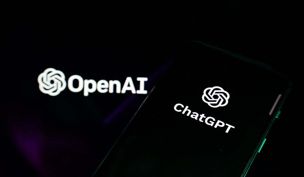 ChatGPT and OpenAI logo on screens