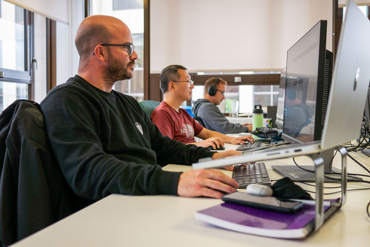 developers working in Envisage office