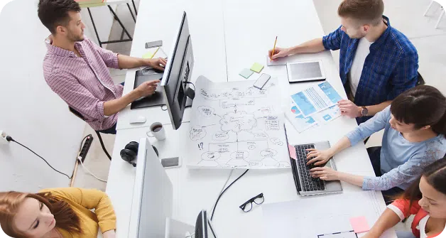 People working in an office on computers